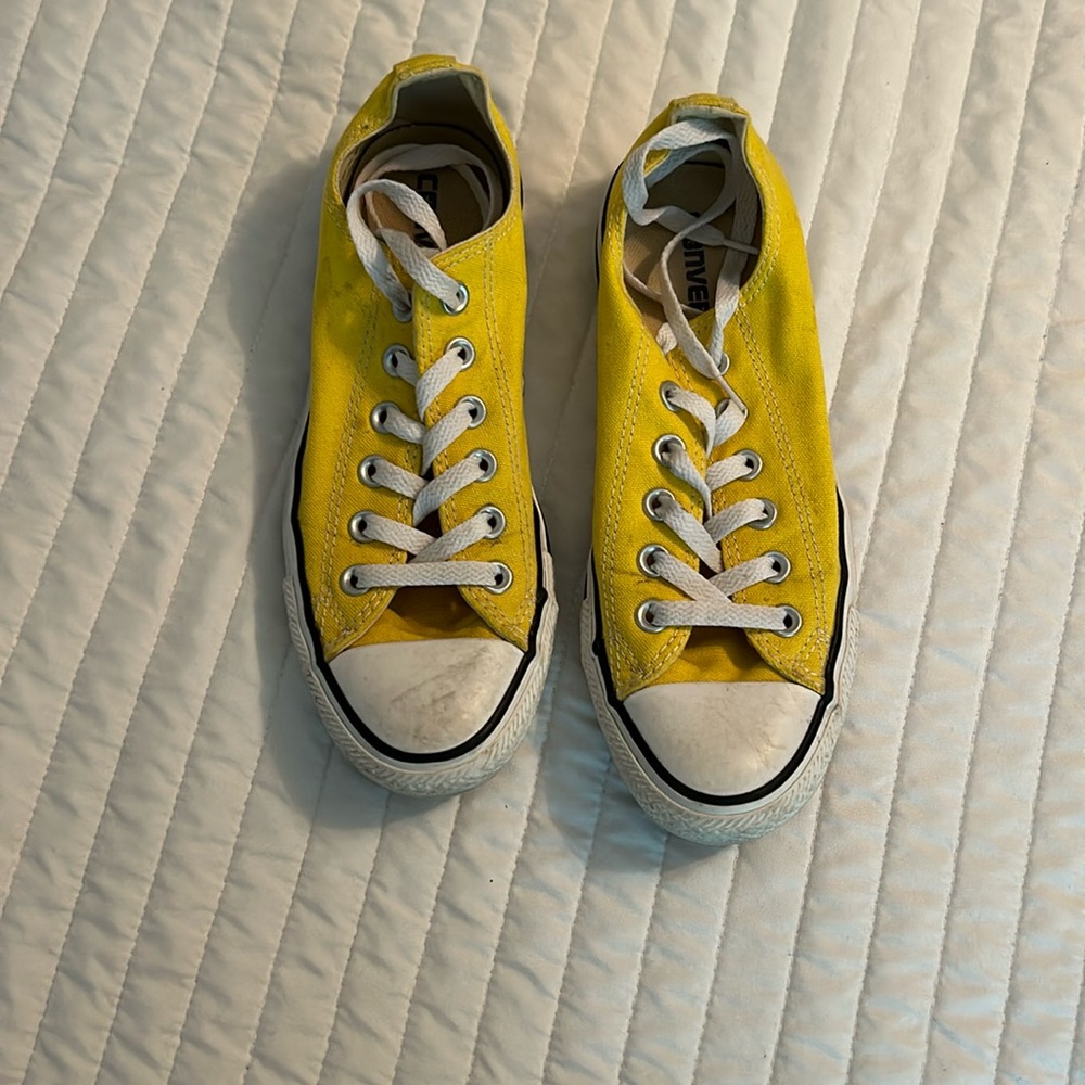 Yellow converse.